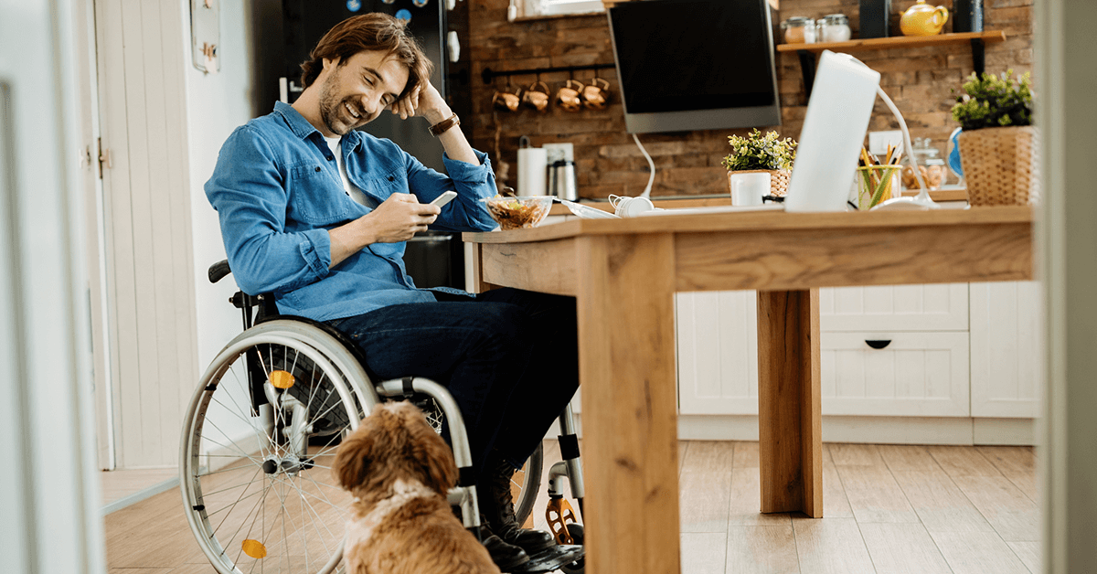 Man in wheelchair with dog